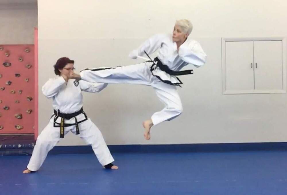 The author does a side kick. (Courtesy Linda Button)