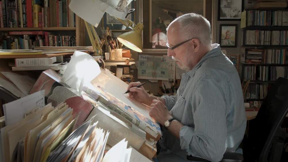 Paddington Bear illustrator R.W. Alley drawing in his Barrington studio. (Mike Jones/Ocean State Media)