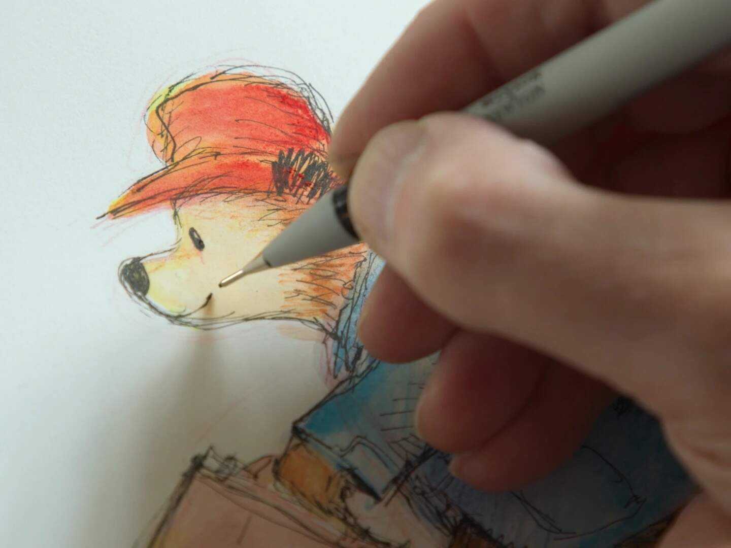 Illustrator R.W. Alley drawing Paddington Bear. (Mike Jones/Ocean State Media)