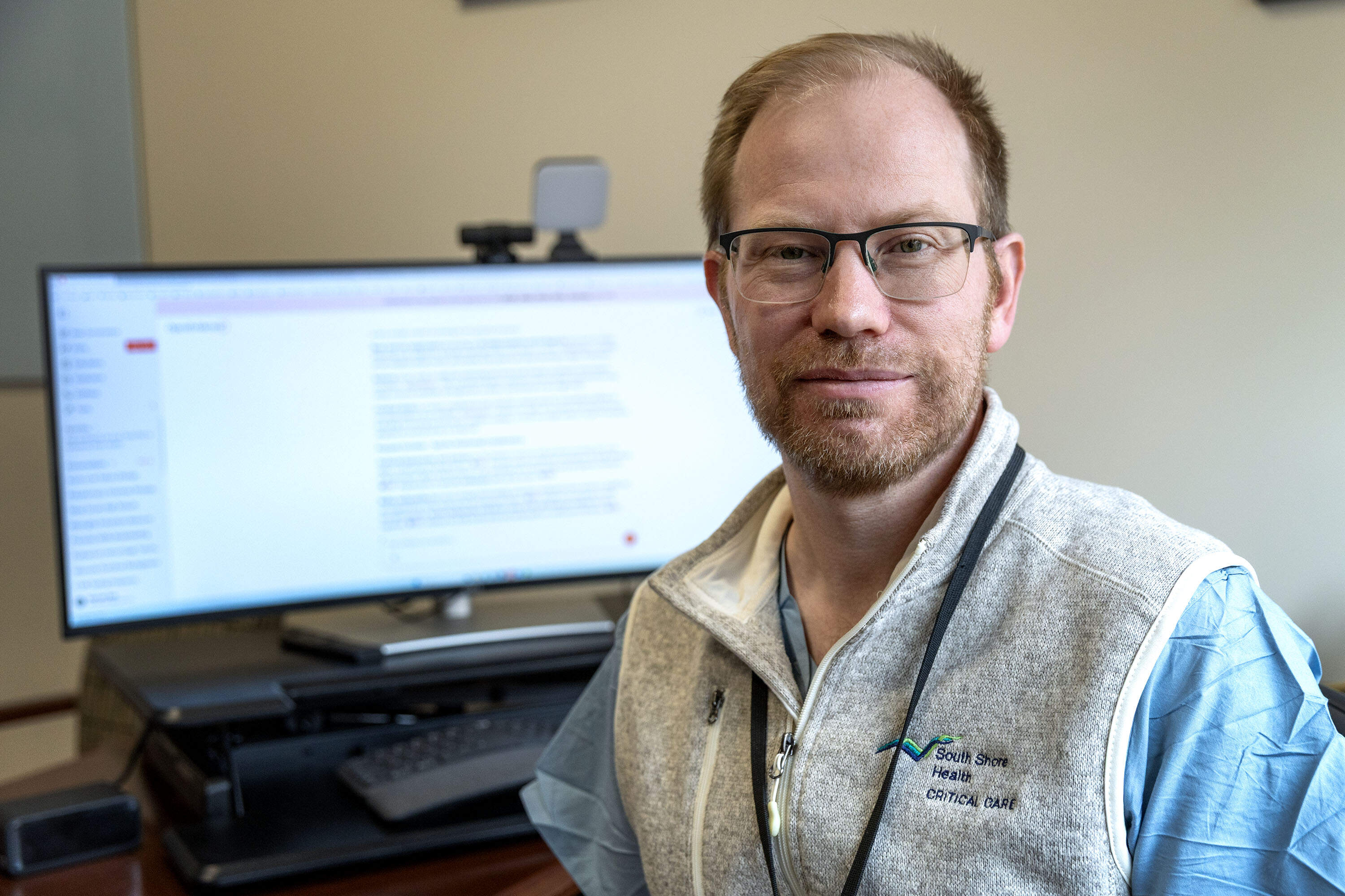 Sam Ash is vice president of information and technology and innovation at South Shore Hospital. He helps oversee the hospital's use of AI. (Robin Lubbock/WBUR)
