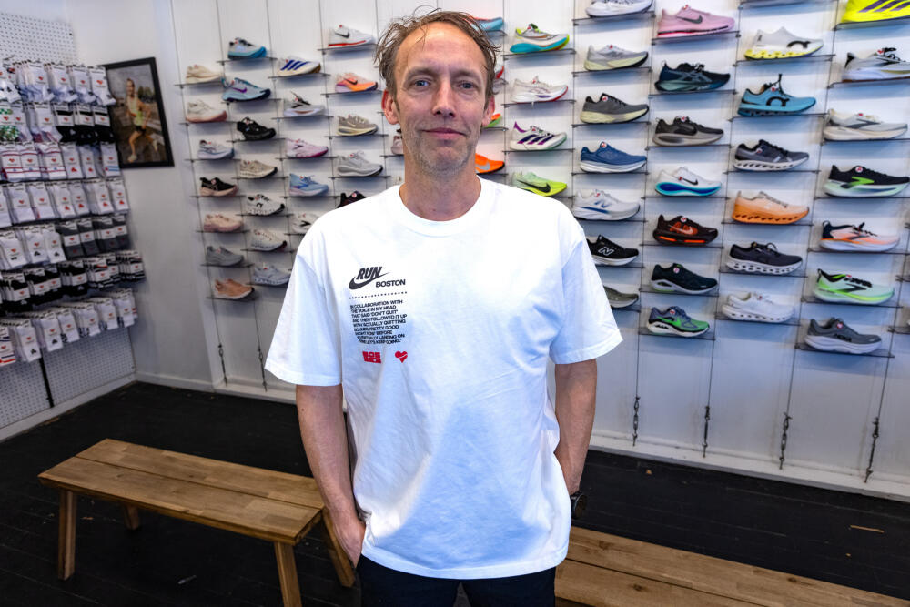 Co-founder Dan Fitzgerald at the Heartbreak Hill Running Company. (Jesse Costa/WBUR)