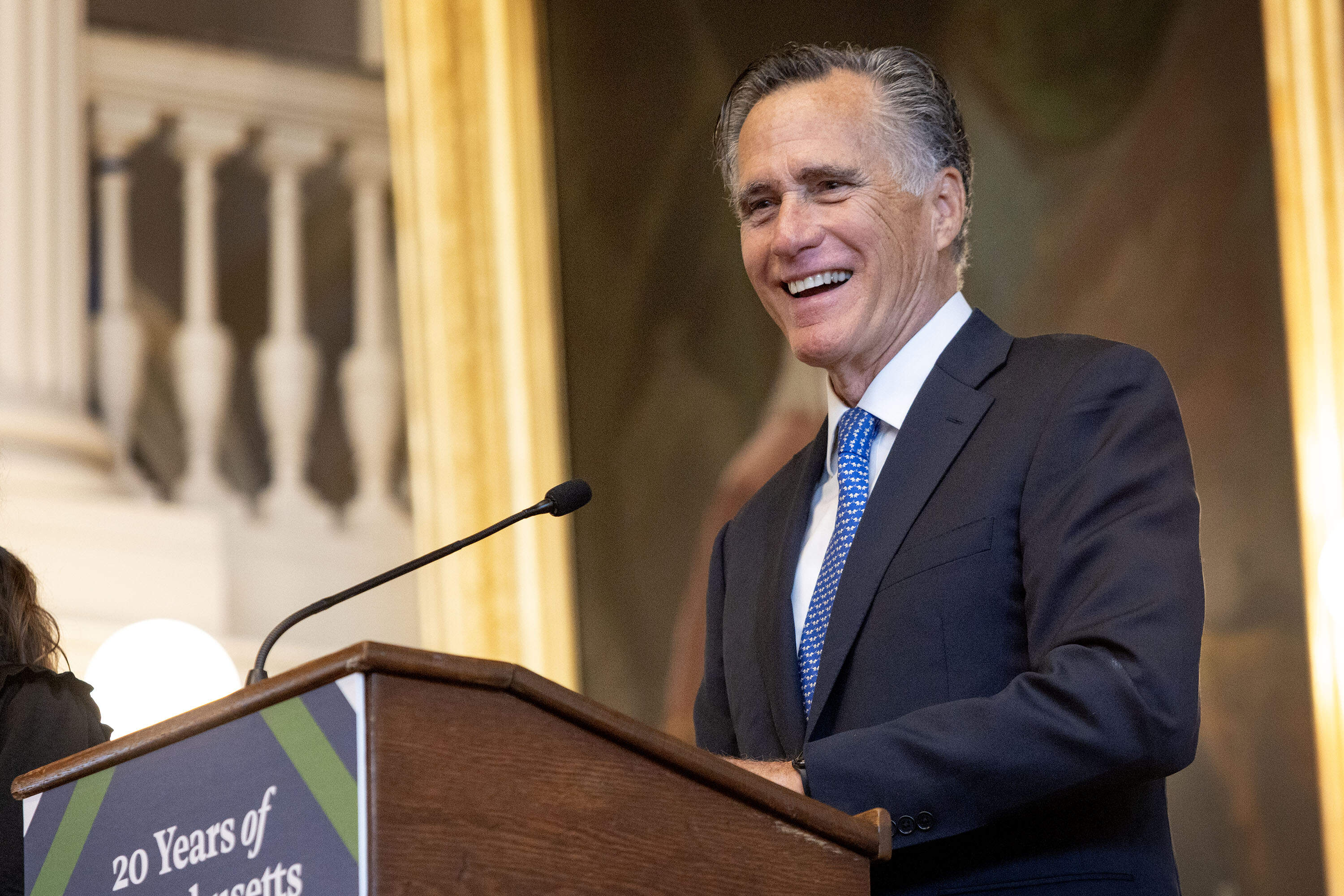 Former Gov. Mitt Romney speaks at a gathering in Faneuil Hall to celebrate 20 years of Massachusetts health care reform. (Robin Lubbock/WBUR)