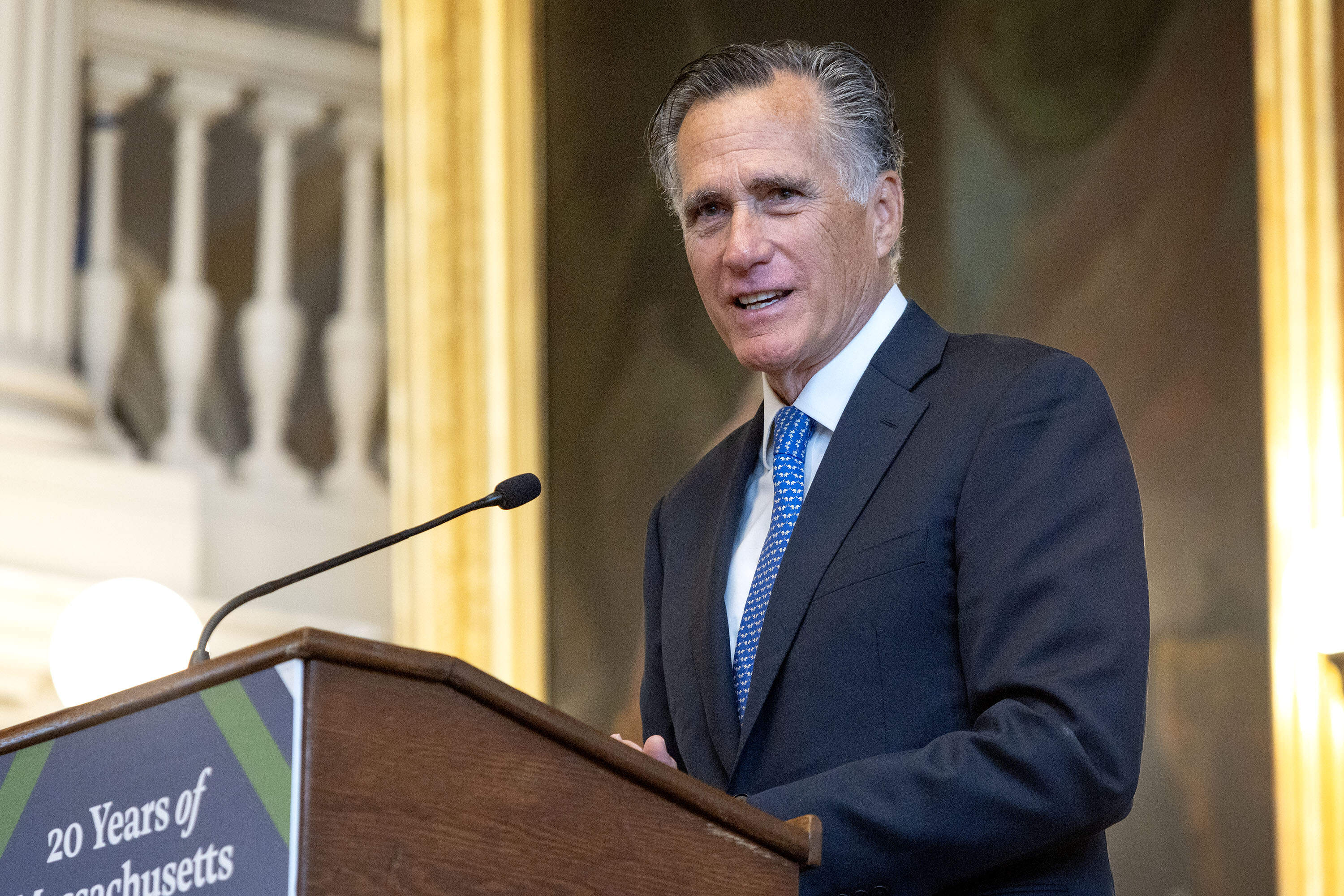 Former Gov. Mitt Romney speaks at a gathering in Faneuil Hall to celebrate 20 years of Massachusetts health care reform. (Robin Lubbock/WBUR)