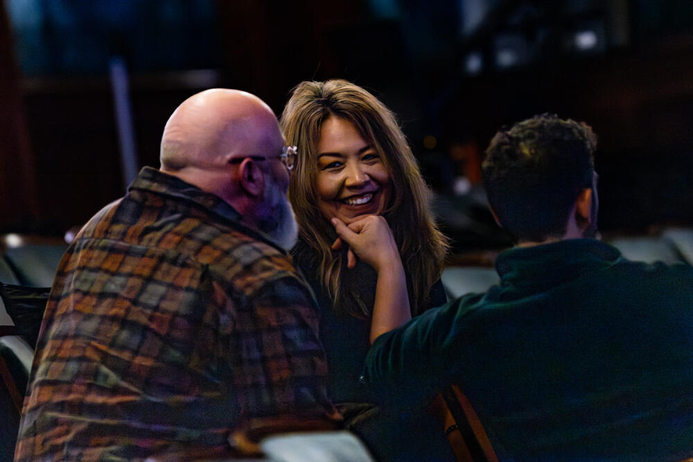 Boston Lyric Opera artistic director Nina Yoshida Nelsen speaks with the production team during a rehearsal at the Emerson Colonial Theatre. (Jesse Costa/WBUR)