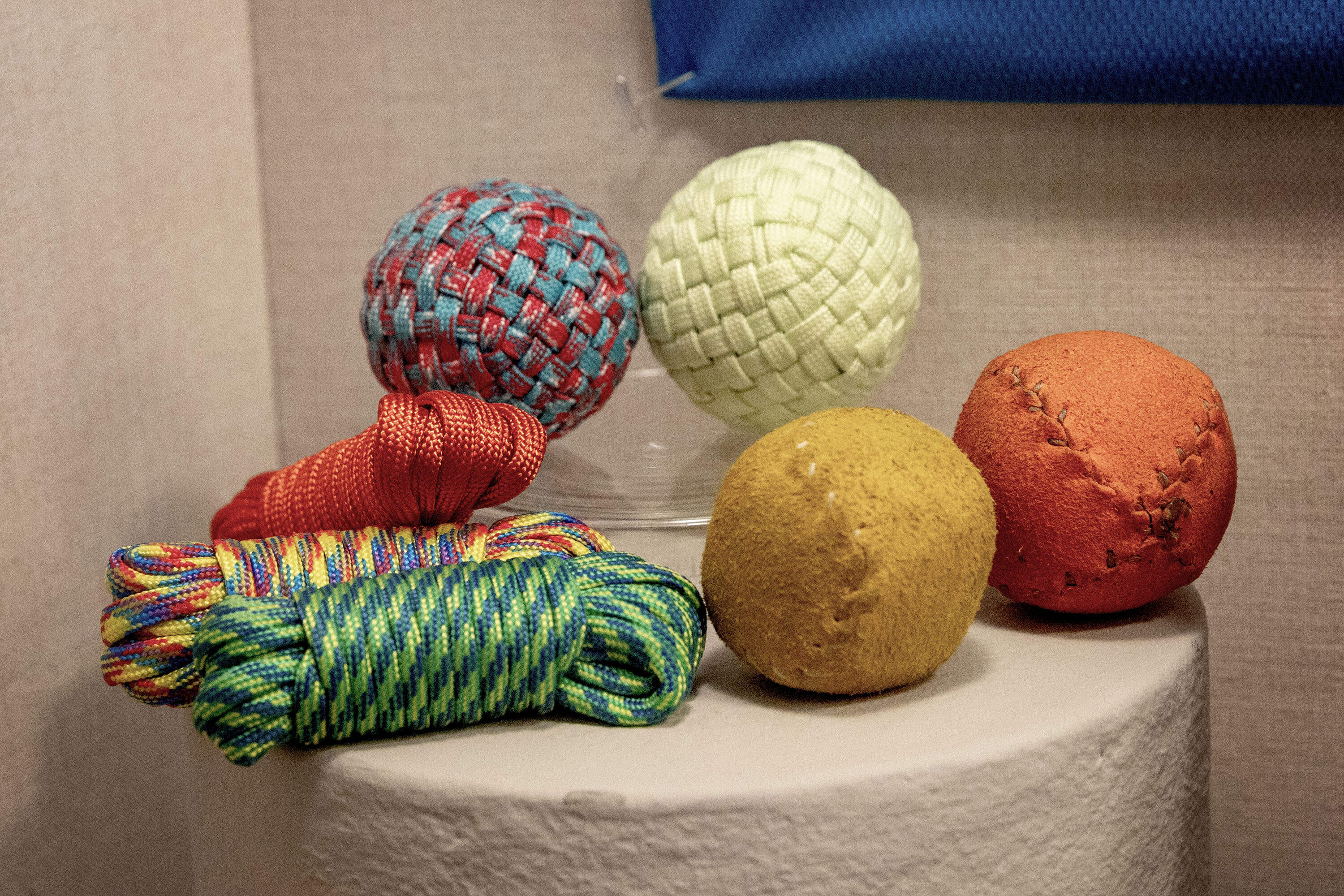 Stickball balls made from leather and cord at the "Stickball @ Harvard" exhibit at Harvard's Peabody Museum, in Cambridge. (Robin Lubbock/WBUR)