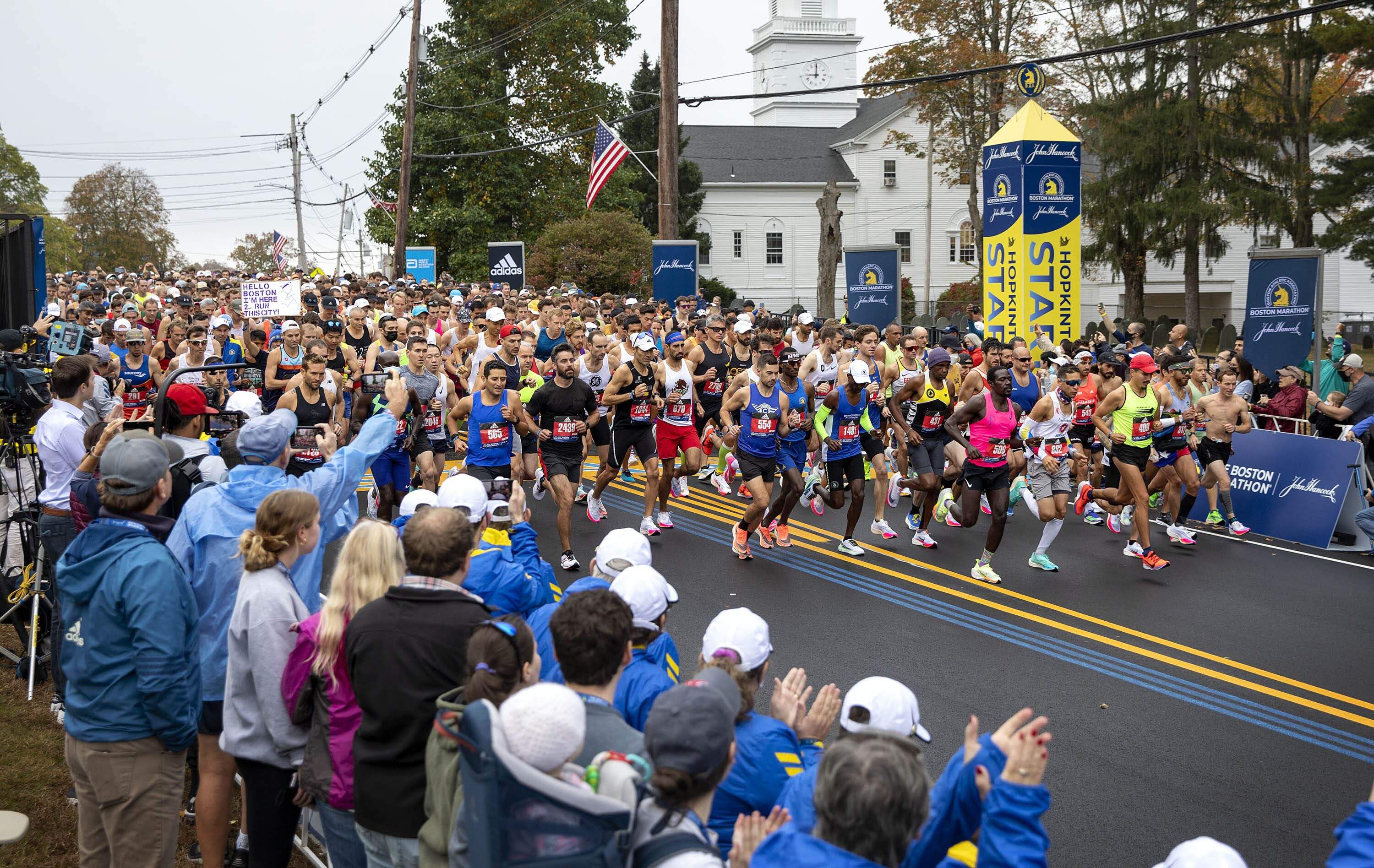 Runners take off from Hopkinton in the 2021 Boston Marathon. (Robin Lubbock/WBUR file)