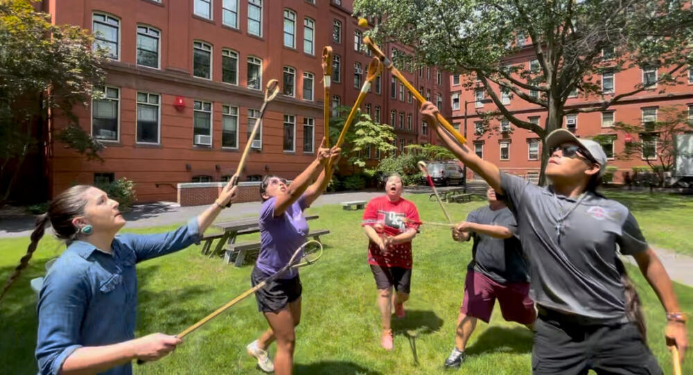 Stickball players at Harvard University. (Courtesy James Walkingstick)