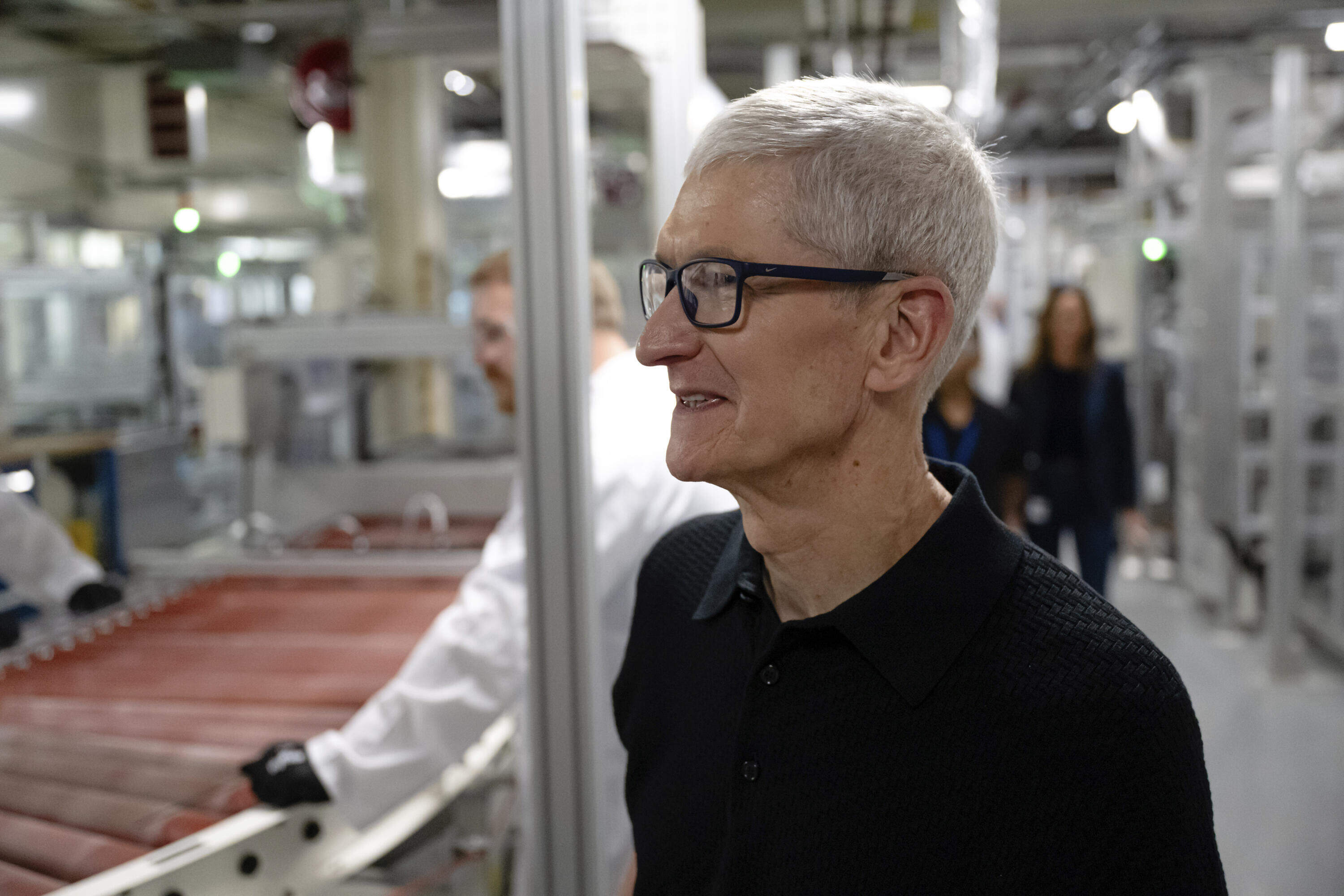 Apple CEO Tim Cook looks on during a tour of Corning's iPhone glass manufacturing facility Friday, Sept. 12, 2025, in Harrodsburg, Ky. (Jon Cherry/AP)