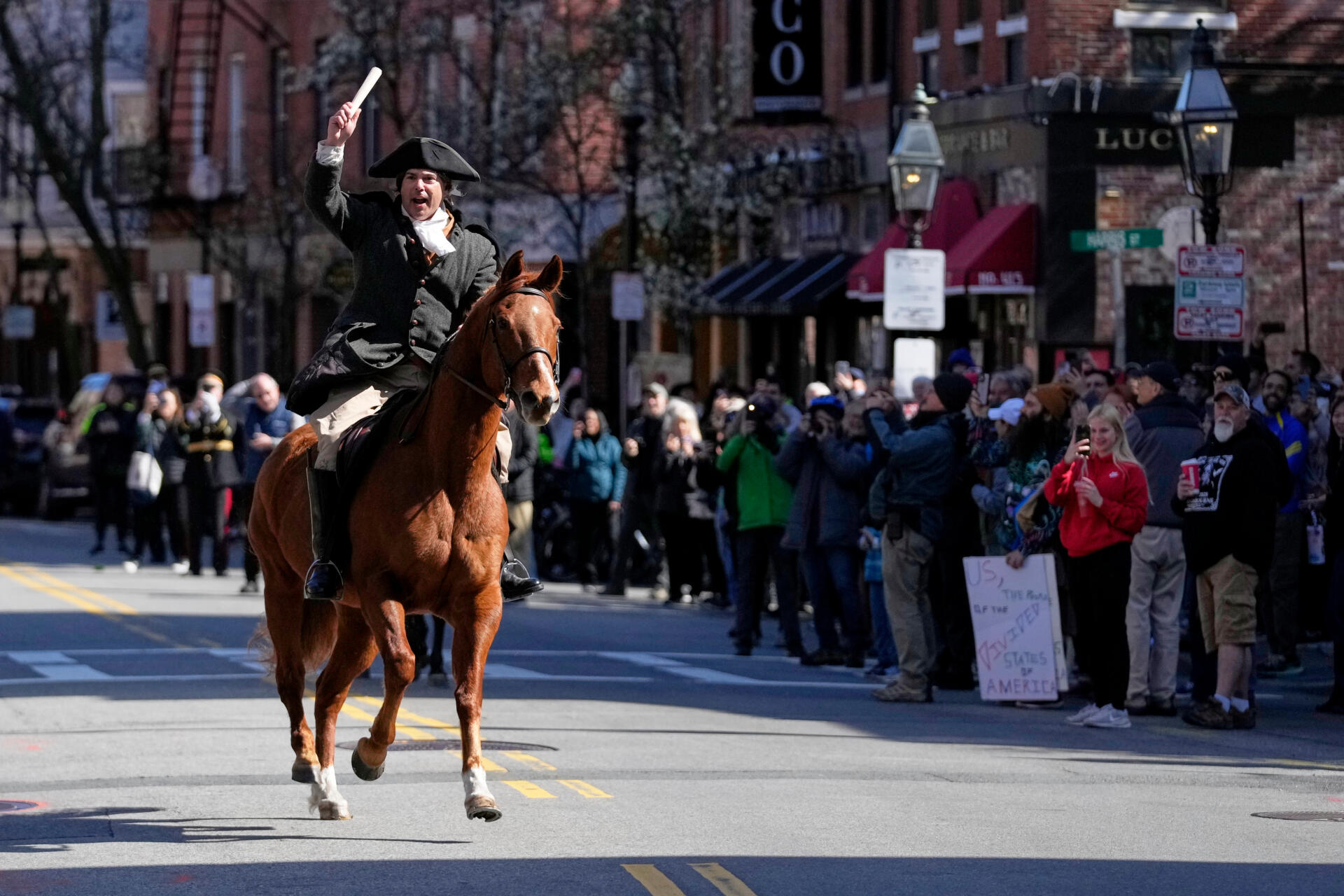 Brig. Gen. Richard Reale, dressed as American patriot Paul Revere reenacts the 1775 Boston-to-Lexington ride to alert colonists of approaching British troops on Monday, April 20, 2026, in Boston. (Robert F. Bukaty/AP)