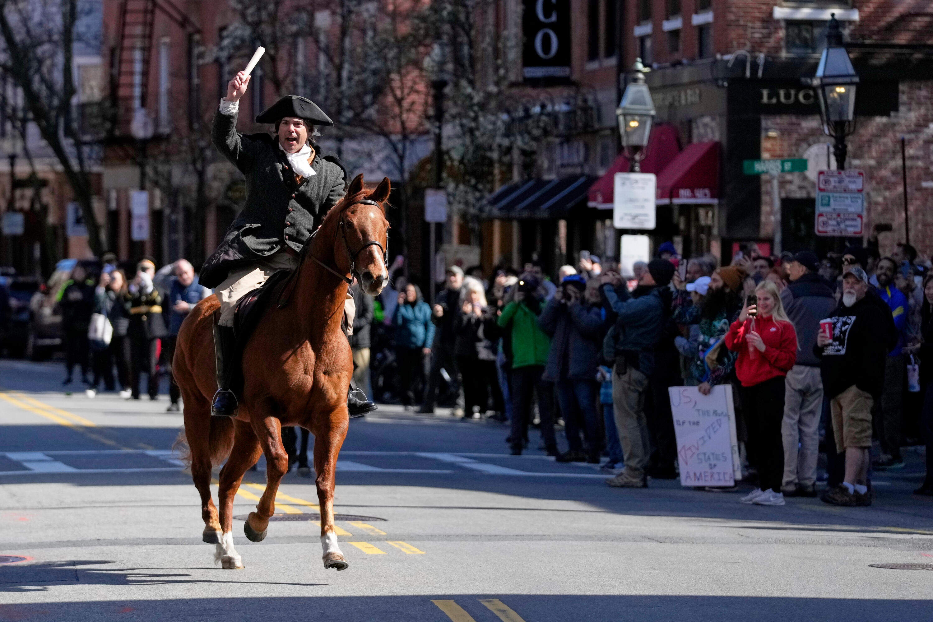 Brig. Gen. Richard Reale, dressed as American patriot Paul Revere reenacts the 1775 Boston-to-Lexington ride to alert colonists of approaching British troops on Monday, April 20, 2026, in Boston. (Robert F. Bukaty/AP)