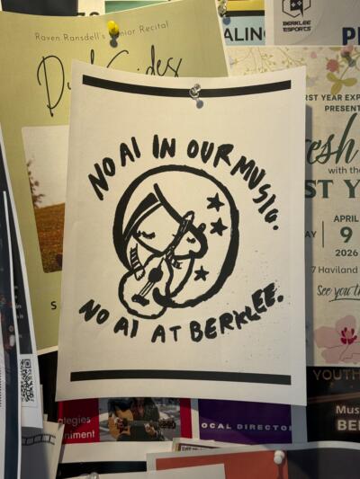 A sign against AI in music appeared on a bulletin board promoting performances and clubs in a Berklee dorm. (Courtesy Keira Mann)
