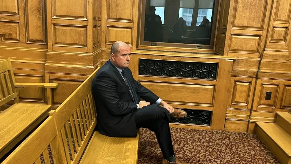 Douglas Darnbrough, formerly presiding judge of New Bedford District Court, sits in the John Adams Courthouse in Boston in 2025. (Ben Berke/Ocean State Media)