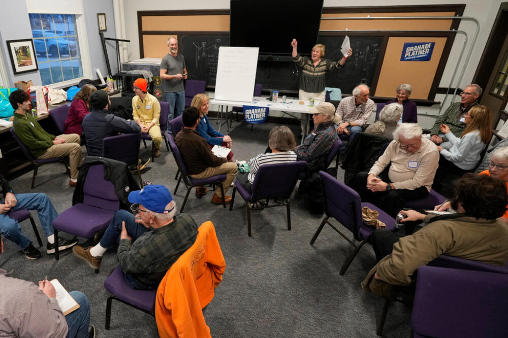 Joanie Monteith leads a trivia night for supporters of U.S. Senate candidate Graham Platner, Thursday, March 26, 2026, in Kittery, Maine. (Robert F. Bukaty/AP)
