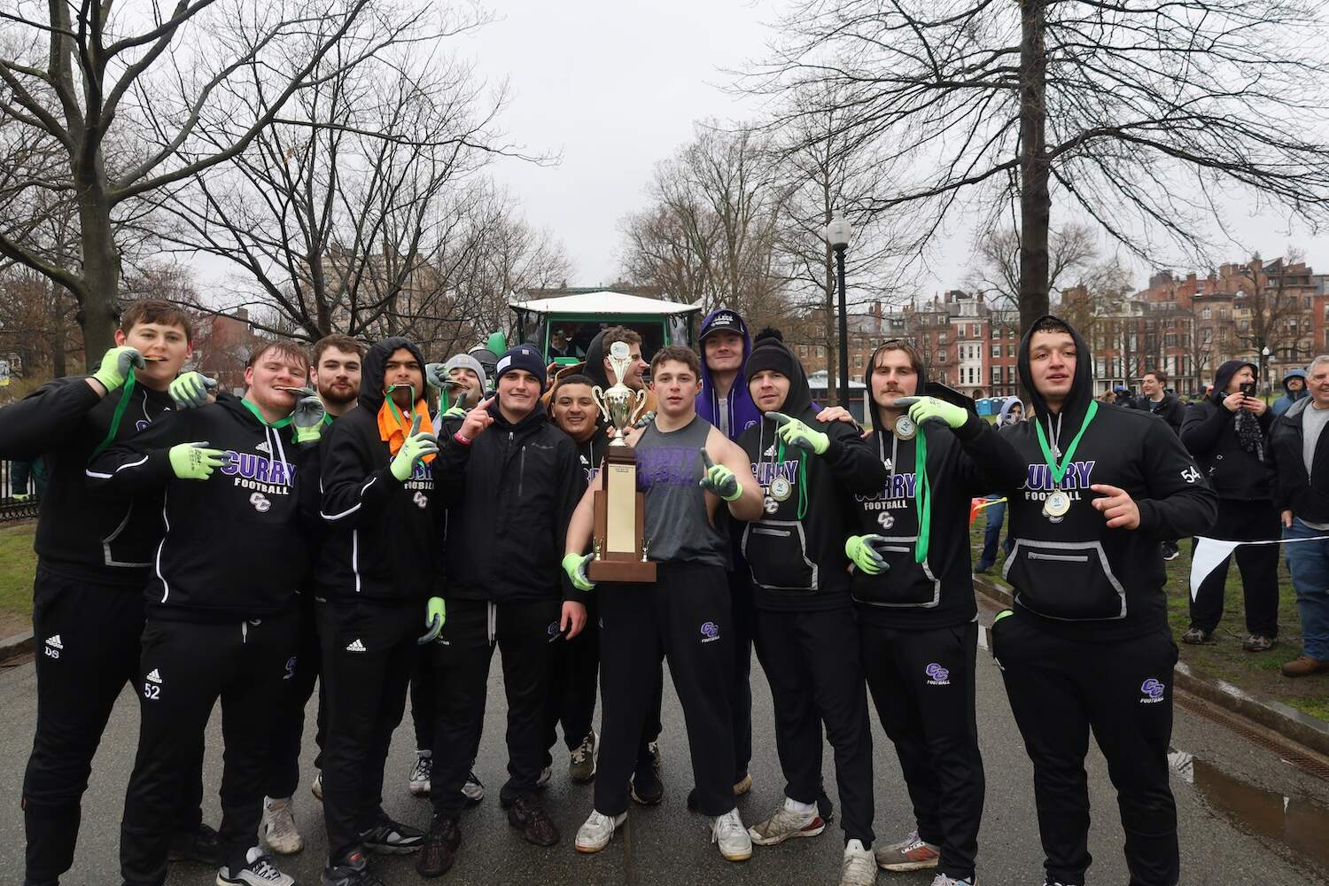 The Curry College football team poses after winning the 2025 Duck Boat Challenge. (Courtesy of the Boston Parks and Recreation Department)
