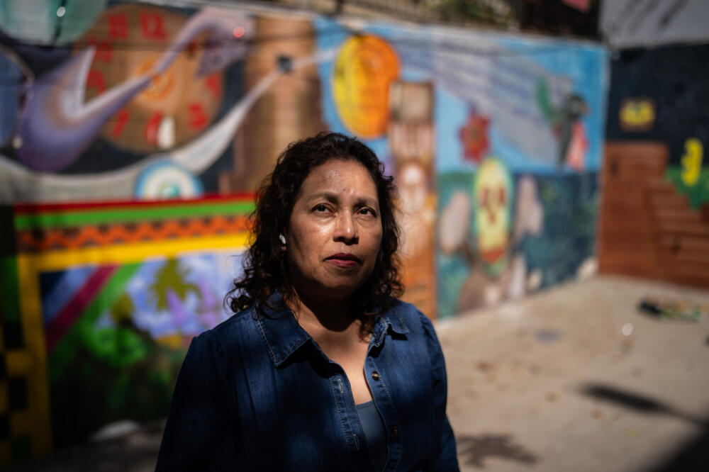 Lorena Zepeda, an immigrant from El Salvador who works for the Central American Resource Center (CARECEN), poses for photos, in Los Angeles, Tuesday, March 24, 2026. (AP Photo/Jae C. Hong)