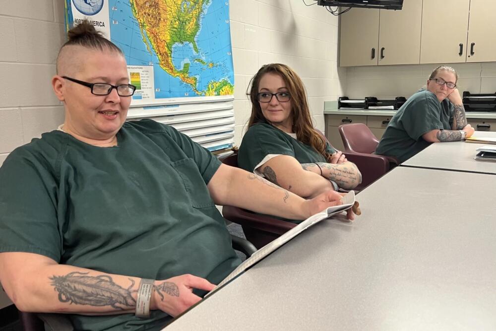 Jess Hutchins reads from an autobiographical essay she wrote for a memoir class at the Barnstable County Correctional Facility, Jan. 8, 2026. (Jennette Barnes/CAI)