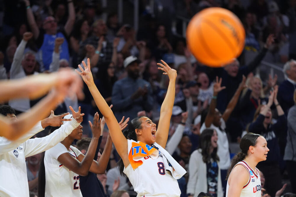 UConn center Jana El Alfy (8) reacts after teammate Blanca Quiñonez, not visible, scored a three-point basket against the Notre Dame during the second half in the Elite Eight of the NCAA college basketball tournament, Sunday, March 29, 2026, in Fort Worth, Texas. (LM Otero/AP)