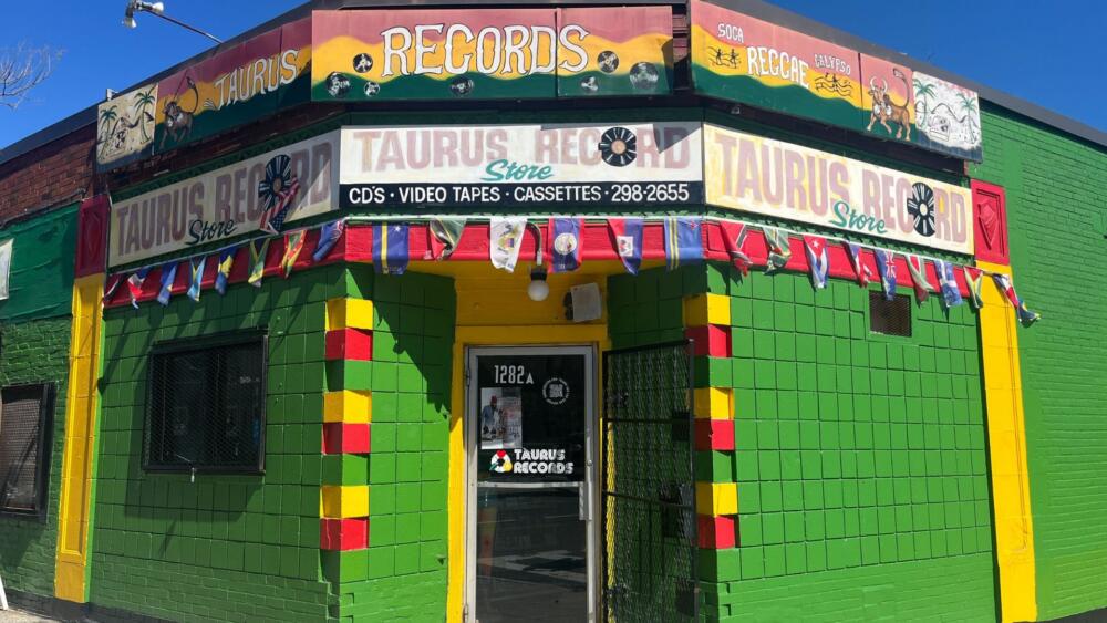 The bright facade of Taurus Records has made the store a local landmark. (Arielle Gray/ WBUR)