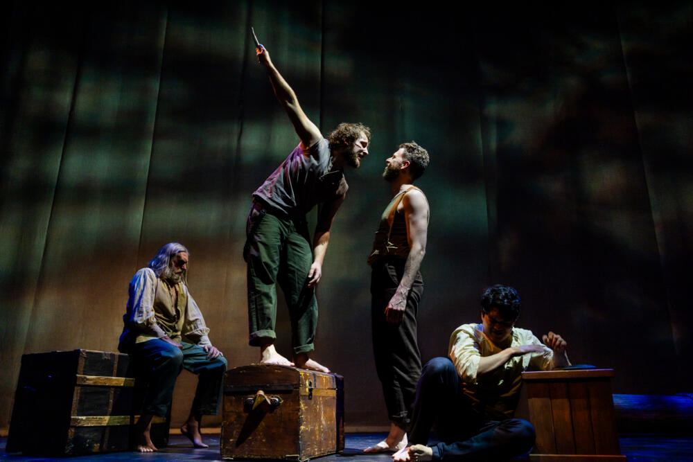 From left: Christopher Chew, Peter DiMaggio, Bishop Levesque and Max Connor in SpeakEasy Stage's production of "Swept Away." (Courtesy Nile Scott Studios)