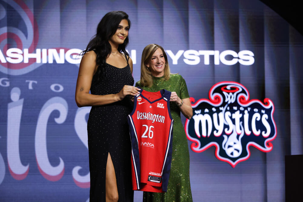 UCLA center Lauren Betts poses with WNBA commissioner Cathy Engelbert after being selected fourth overall by the Washington Mystics in the first round of the 2026 WNBA draft. (Pamela Smith/AP)