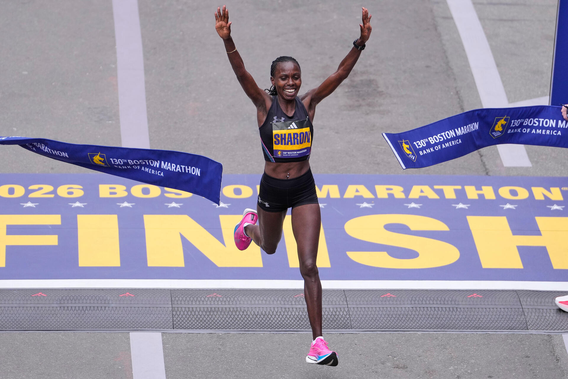 Sharon Lokedi of Kenya, celebrates after winning the women's division of the Boston Marathon, April 20, 2026. (Charles Krupa/AP)