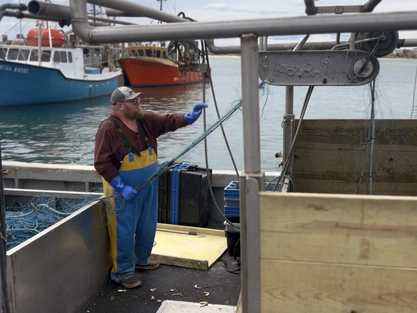 Patrick Duckworth on his boat the Port of Galilee in Narragansett, R.I. (David Wright/Ocean State Media)