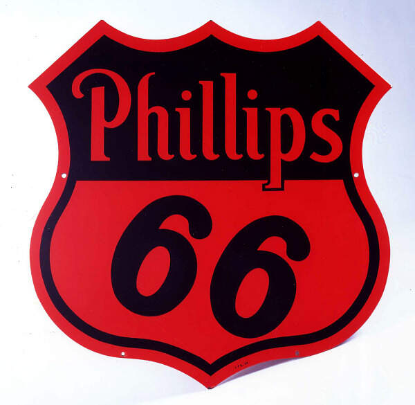 Building Route 66 in the mid-1920s stirred public excitement. One symbol ofinfatuation with the new highway is the Phillips 66 gasoline trade name. Introduced in 1927, the name was inspired by a test drive at 66 miles per hour on a stretch of Route 66 in Oklahoma. The Phillips 66 sign, unveiled in 1930, combined the trade name with the shape of a U.S. highway route marker. The sign has continued in use with minor revisions. This example was made in 1956. (Courtesy of the Smithsonian’s National Museum of American History, Gift of Phillips Petroleum Company)