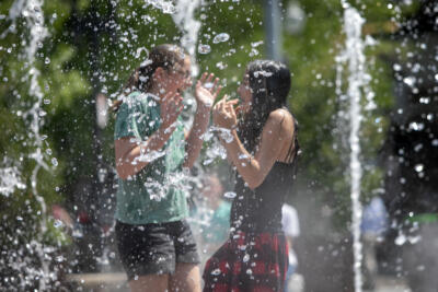 Families and kids stay cool in Boston with spray decks, water fountains