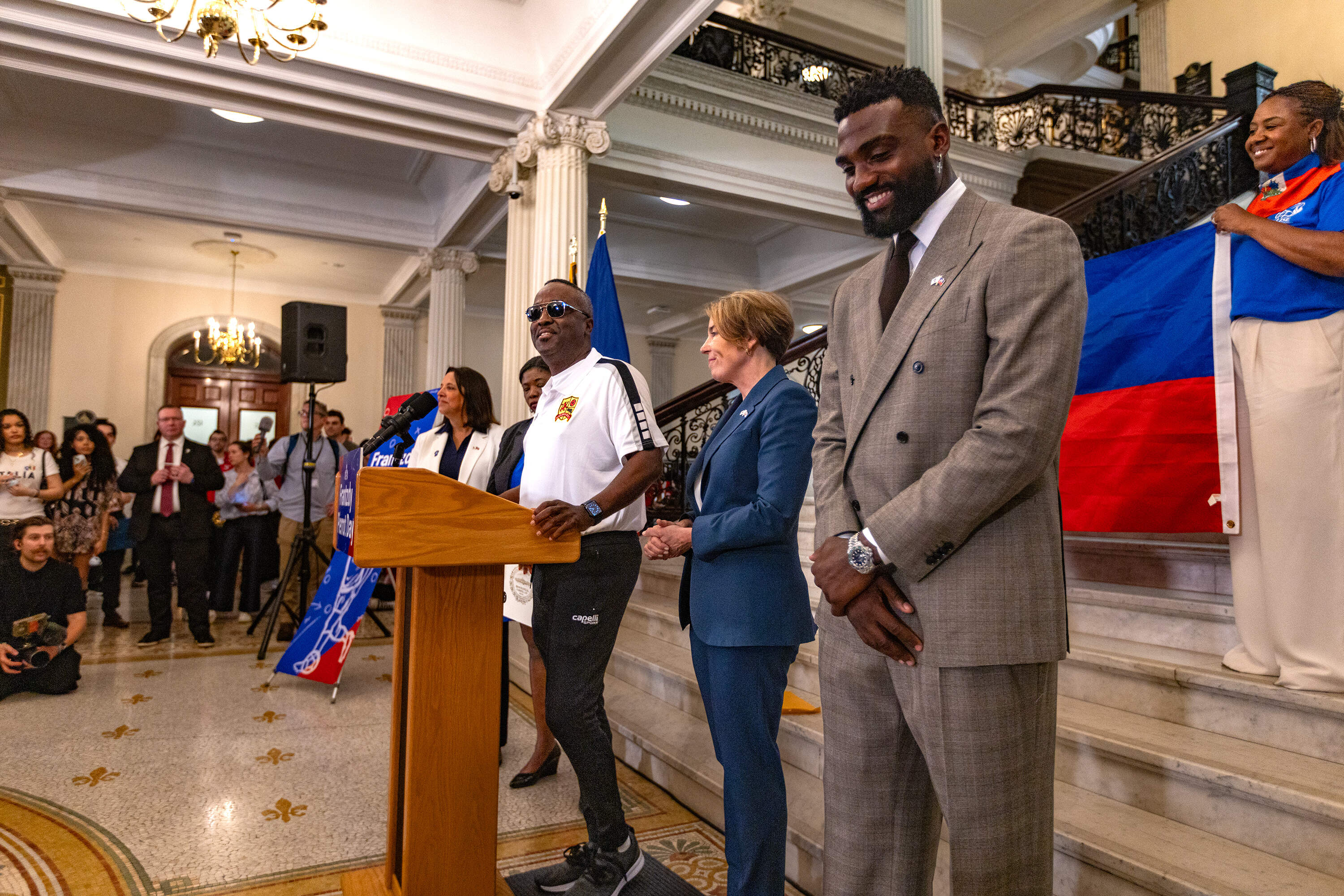 Corlton Simmond, Frantzdy Pierrot’s soccer coach when he was at Melrose High School, speaks to the crowd during the proclamation ceremony of Frantzdy Pierrot Day at the State House. (Jesse Costa/WBUR)
