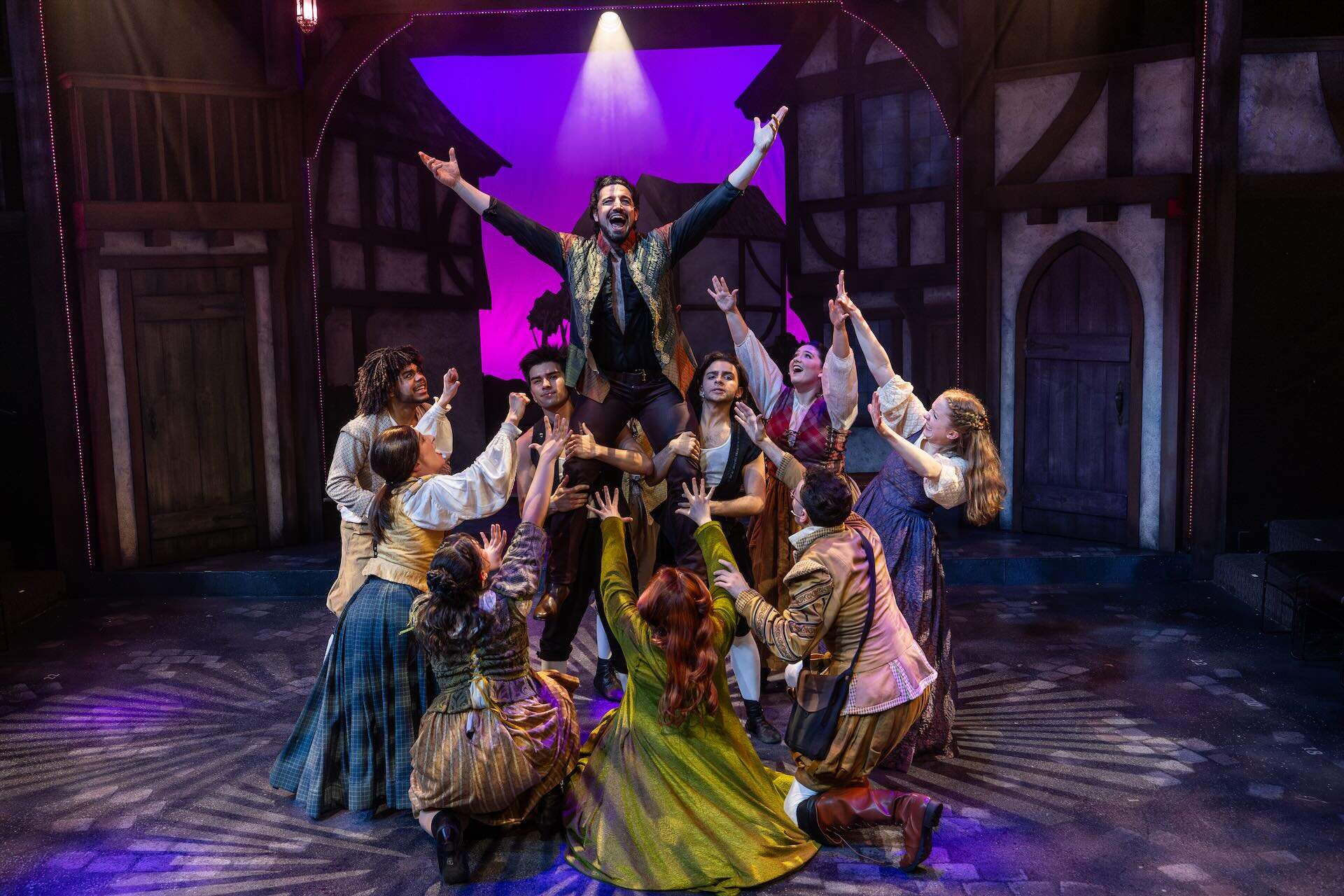 Jared Troilo (top, center) as William Shakespeare with the cast of Lyric Stage's "Something Rotten!" (Courtesy Nile Hawver)
