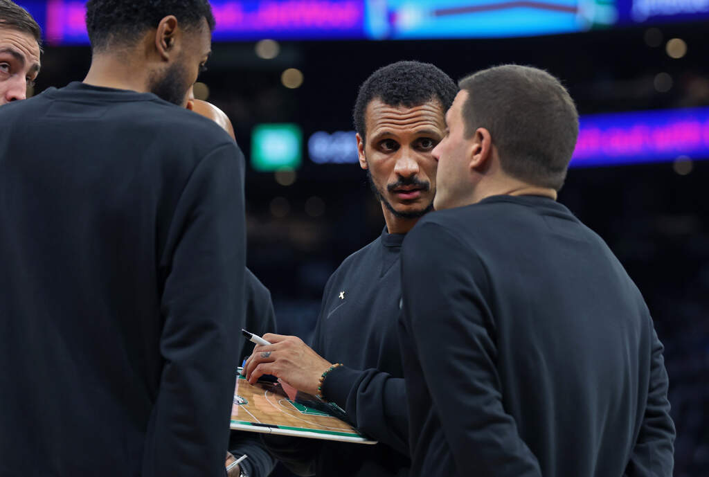 Boston Celtics' head coach Joe Mazzulla, center, is pictured with some of his assistant coaches during Game 7 of a first round NBA basketball playoffs series, Saturday, May 2, 2026 in Boston. (Jim Davis/AP)
