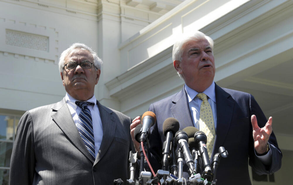 In this May 21, 2010, file photo, then-Senate Banking Committee Chairman Sen. Christopher Dodd, D-Conn., right, and then- House Financial Services Committee Chairman Rep. Barney Frank, D-Mass., speak to reporters outside the White House in Washington. (Susan Walsh/AP, File)