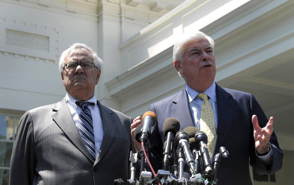 In this May 21, 2010, file photo, then-Senate Banking Committee Chairman Sen. Christopher Dodd, D-Conn., right, and then- House Financial Services Committee Chairman Rep. Barney Frank, D-Mass., speak to reporters outside the White House in Washington. (Susan Walsh/AP, File)