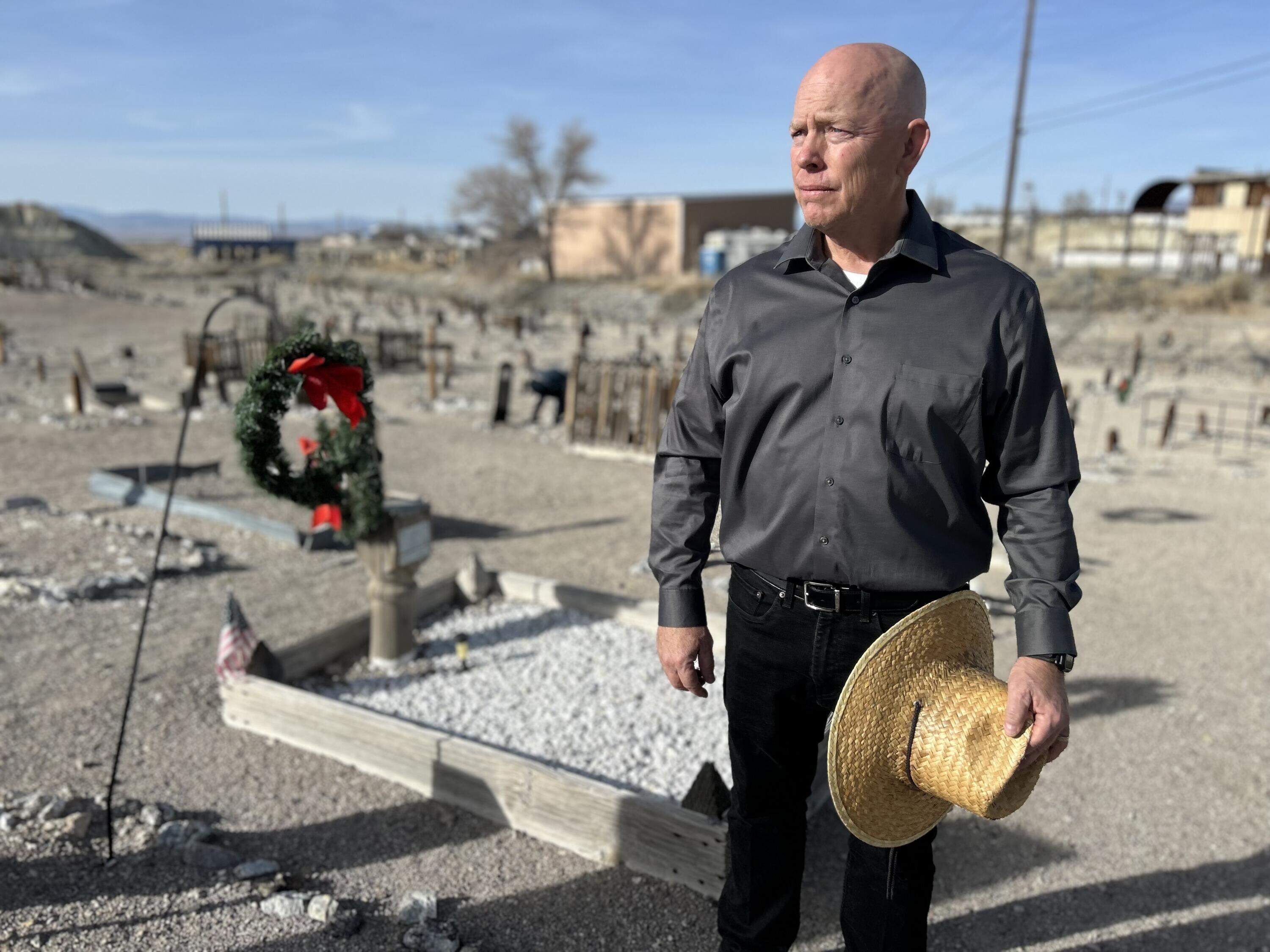 Joe Westerlund, town manager of Tonopah, Nev., pictured at a local cemetery. (Peter O'Dowd/Here &amp; Now)