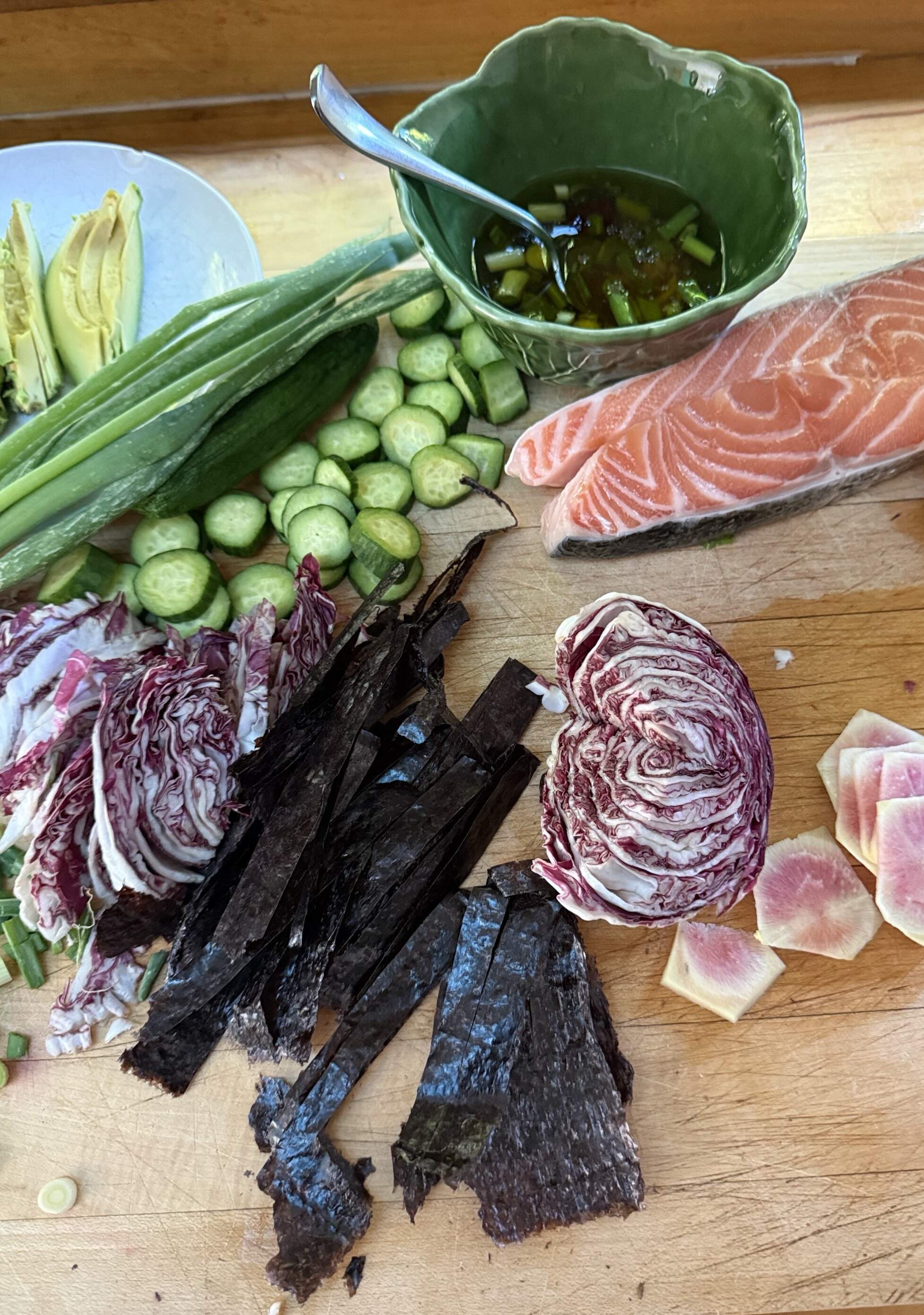The ingredients for salmon, rice, avocado, cucumber and radicchio salad with a ginger-lemon dressing. (Kathy Gunst/Here &amp; Now)
