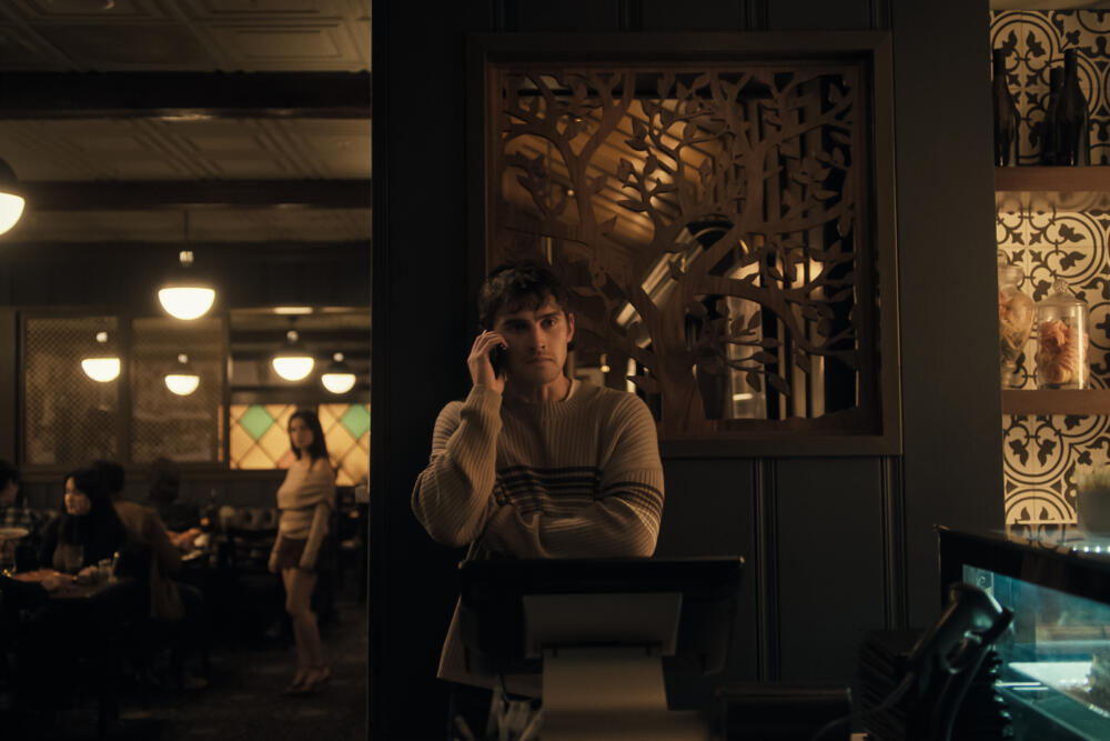 Inde Navarrette (background) and Michael Johnston in "Obsession." (Courtesy Focus Features)