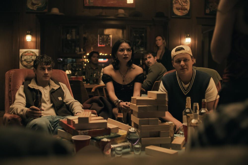 From left: Michael Johnston, Megan Lawless and Cooper Tomlinson in "Obsession." (Courtesy Focus Features)
