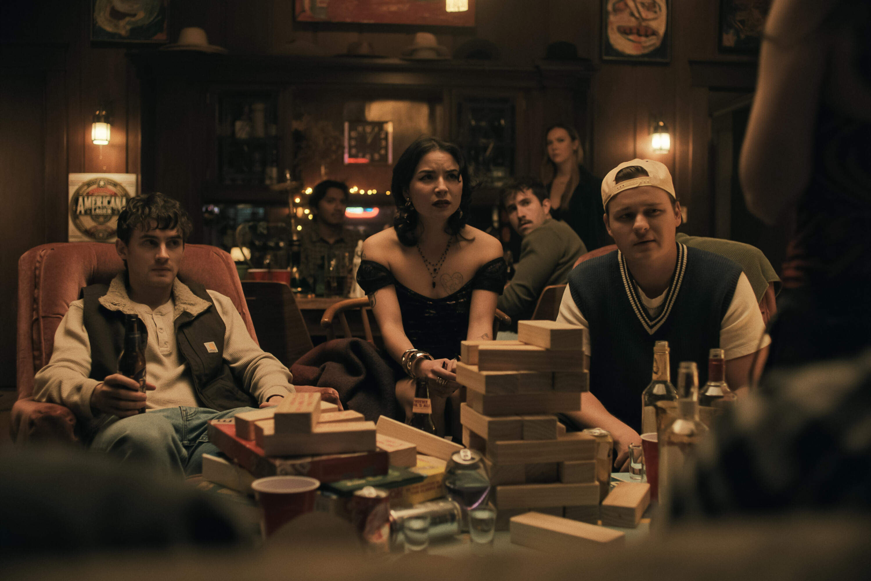 From left: Michael Johnston, Megan Lawless and Cooper Tomlinson in "Obsession." (Courtesy Focus Features)