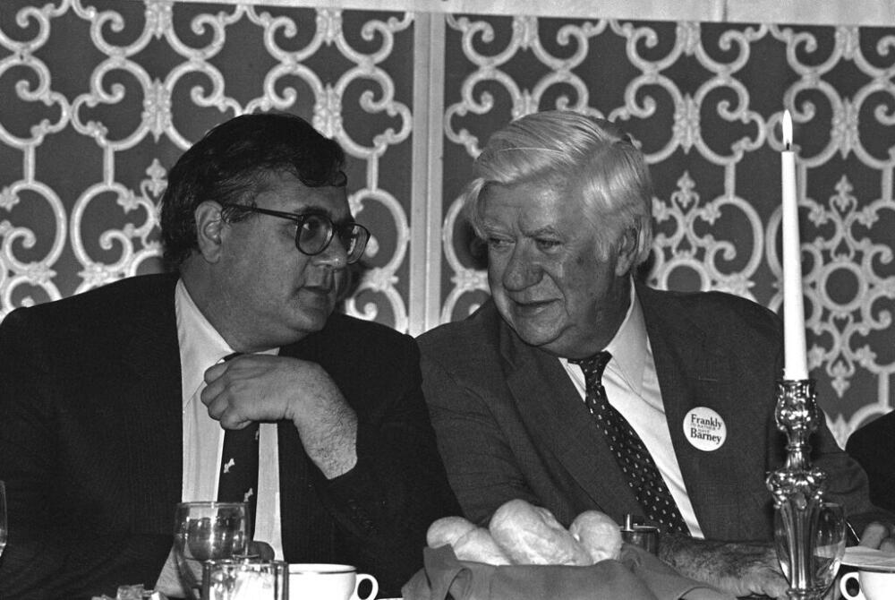 Rep. Barney Frank, left, and U.S. House Speaker Tip O'Neill, right, chat before O'Neill spoke on behalf of Frank's re-election campaign at a luncheon at Natick, Mass., Country Club, Oct. 20, 1982. (Elise Amendola/AP, File)