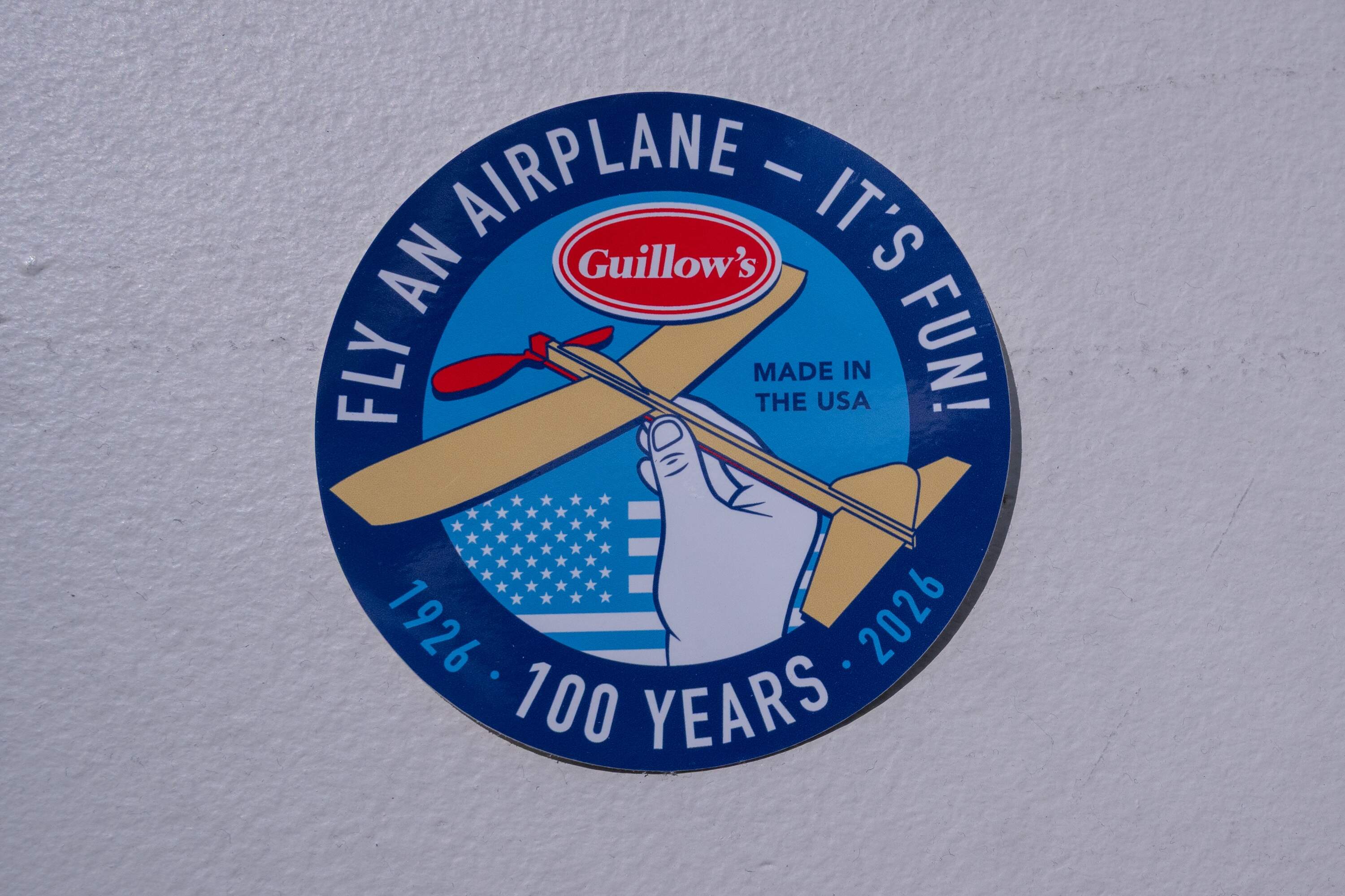 The Guillow's sticker celebrating the Wakefield company's 100th anniversary (Sharon Brody/WBUR)