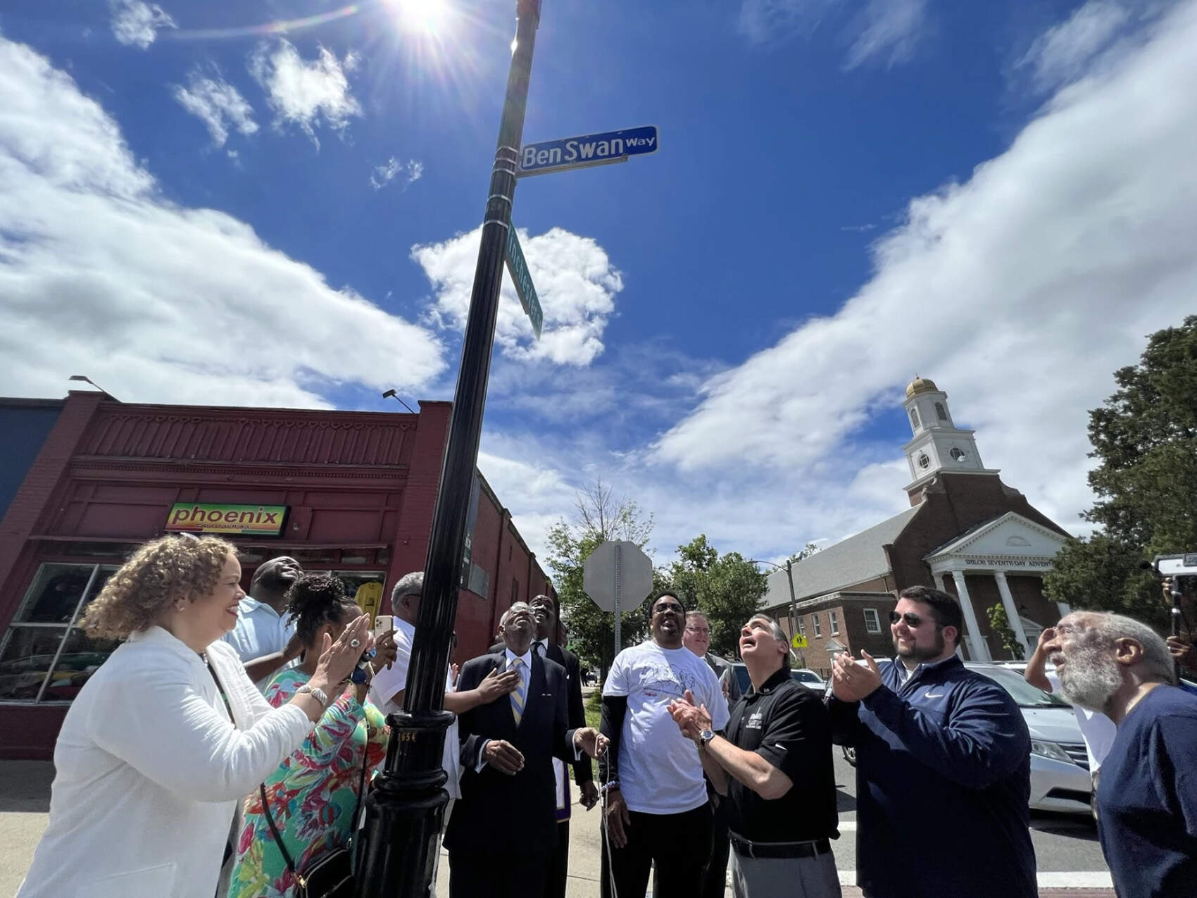 Local leaders cheering as signage for Ben Swan Way went up back in 2022 where State Street meets Wilbraham Road and Eastern Avenue in Springfield. (Courtesy of the Springfield Mayor's office)