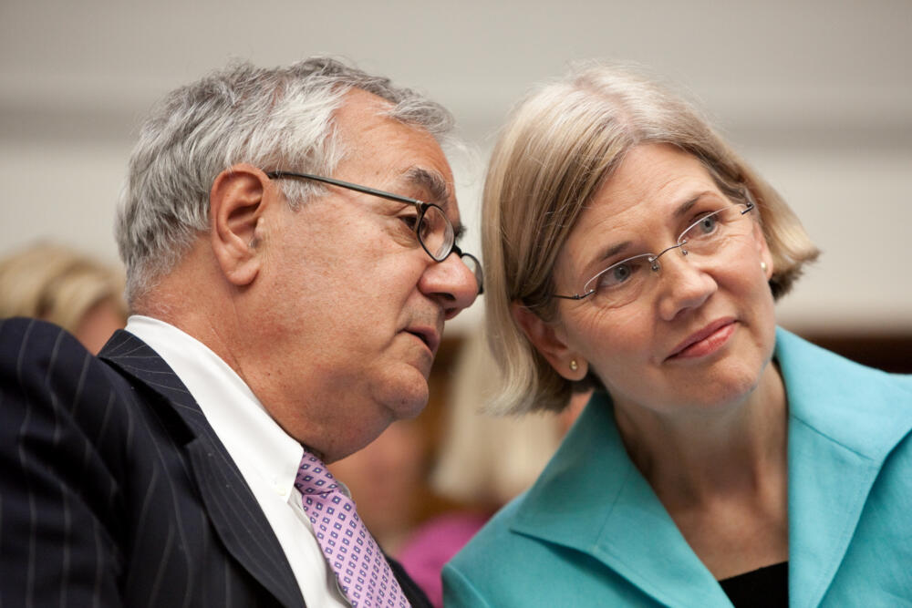 Then-Rep. Barney Frank (D-Mass.), talks with Elizabeth Warren, then-chair of the Troubled Asset Relief Program Congressional Oversight Panel, during a hearing on Capitol Hill on July 22, 2009, in Washington, D.C. (Brendan Hoffman/Getty Images)