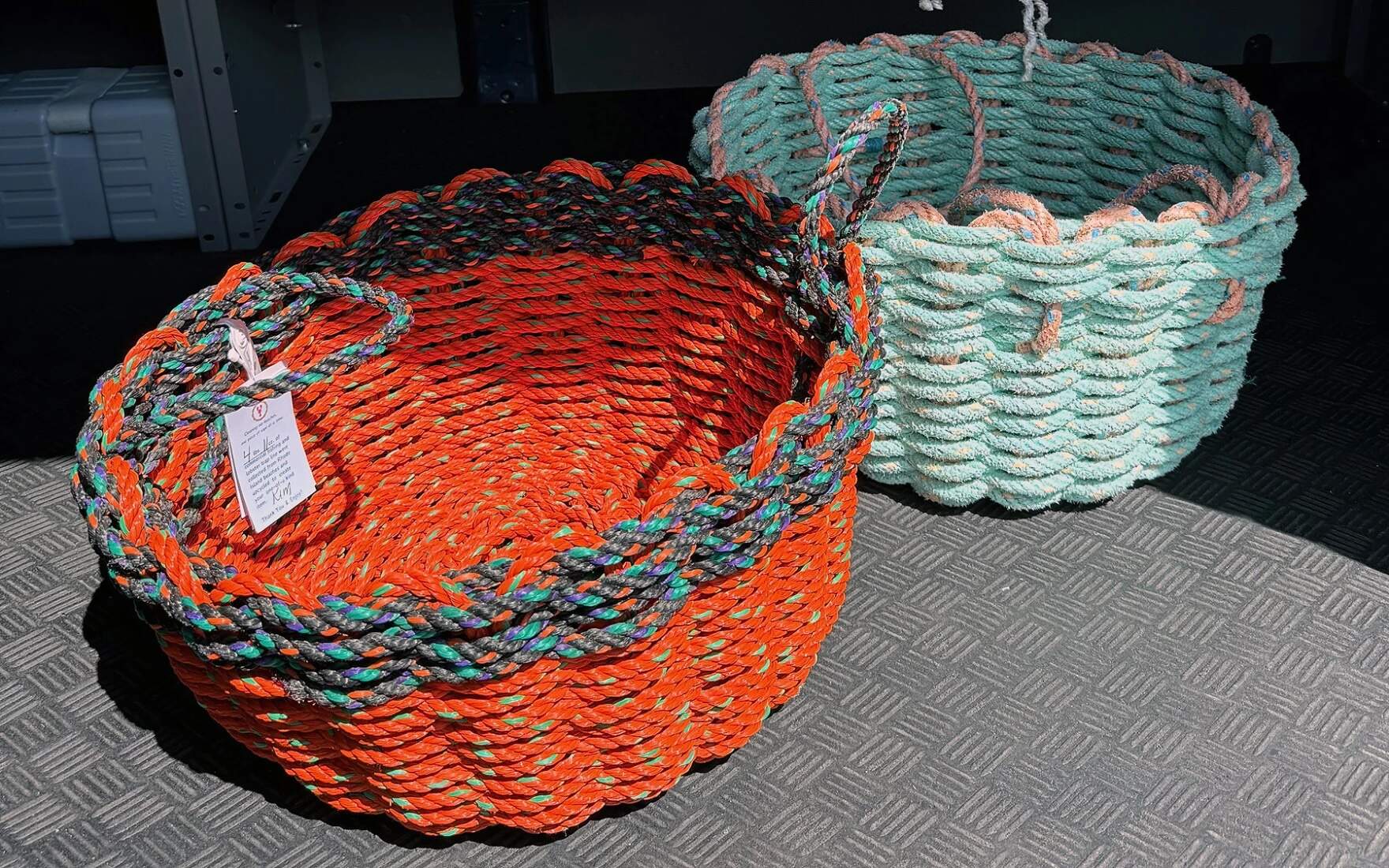Baskets made by Kim Edwards from repurposed fishing line. (Amy Kolb Noyes/CAI)