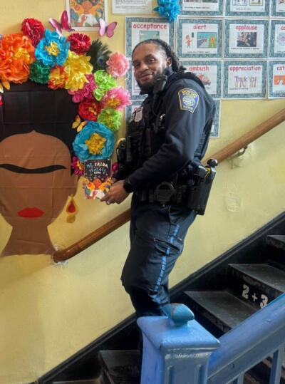 Officer Lorenzo Hooker III, pictured at a school event and posted on the Boston police Facebook page (Boston Police Department Facebook)