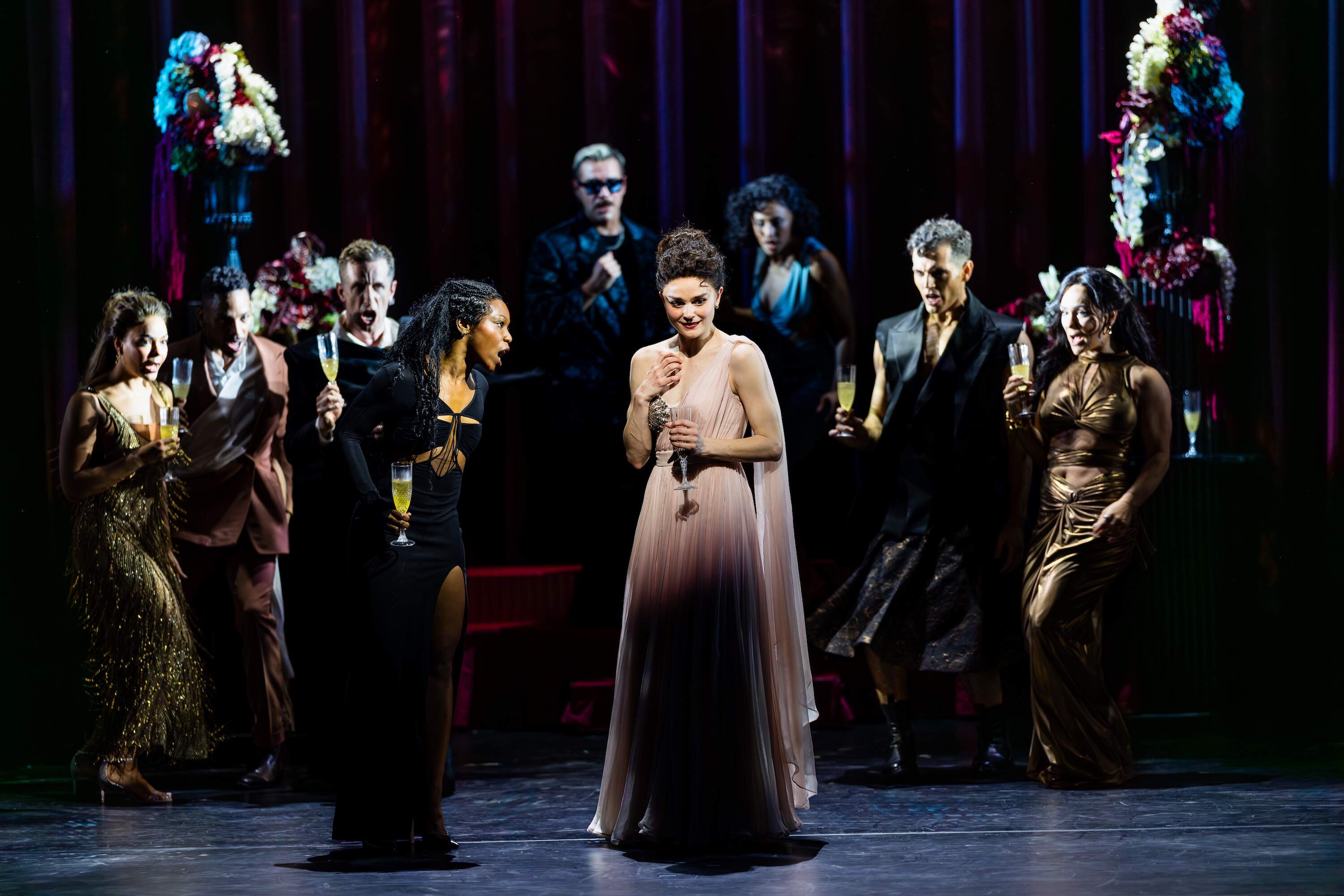 Members of the ensemble surround Melanie Moore (Nina) and Jada Simone Clark (Lily). (Courtesy A.R.T./Hawver and Hall)