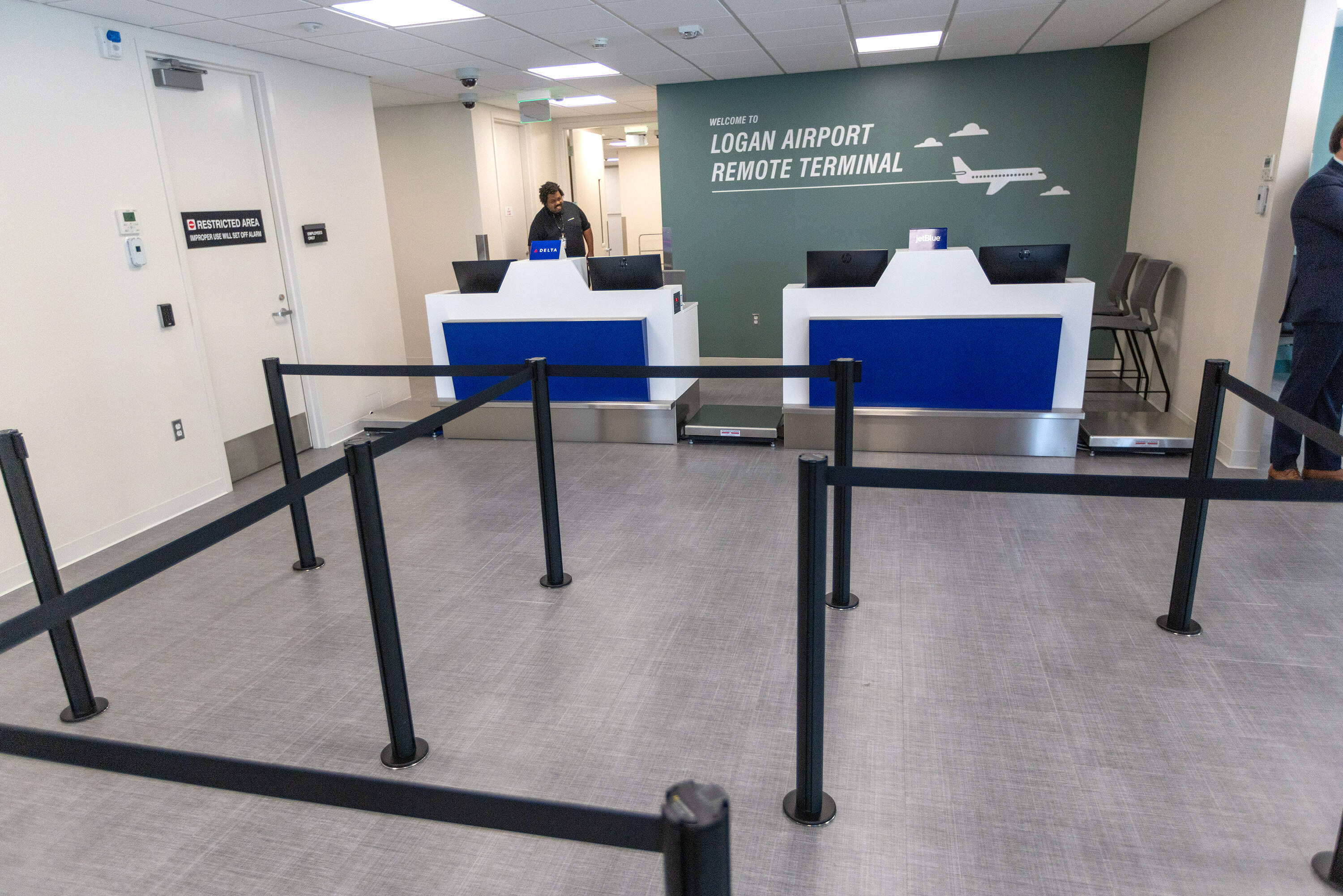 The check in counter at the new Logan Airport Remote Terminal in Framingham. (Jesse Costa/WBUR)