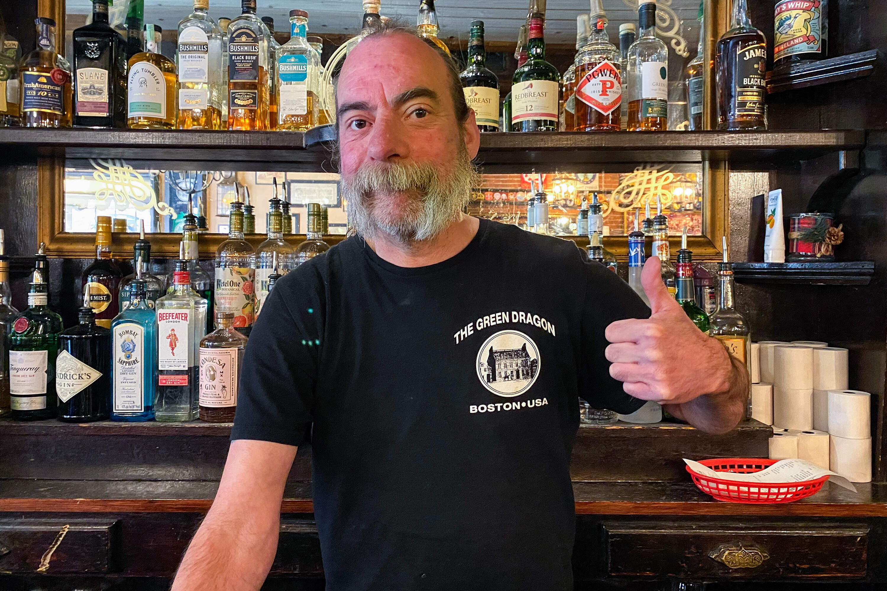 Bartender Chris White has worked at the tavern for more than two decades. (Andrea Shea/WBUR)