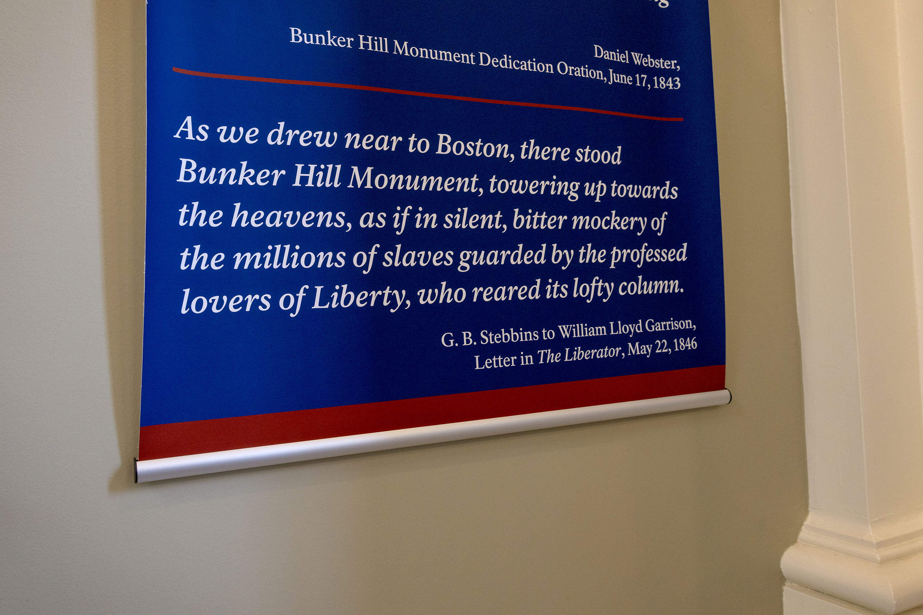 A quote from a letter by G. B. Stebbins published in "The Liberator" on the wall in the Lodge at the Bunker Hill Monument in Charlestown, Mass. (Robin Lubbock/WBUR)