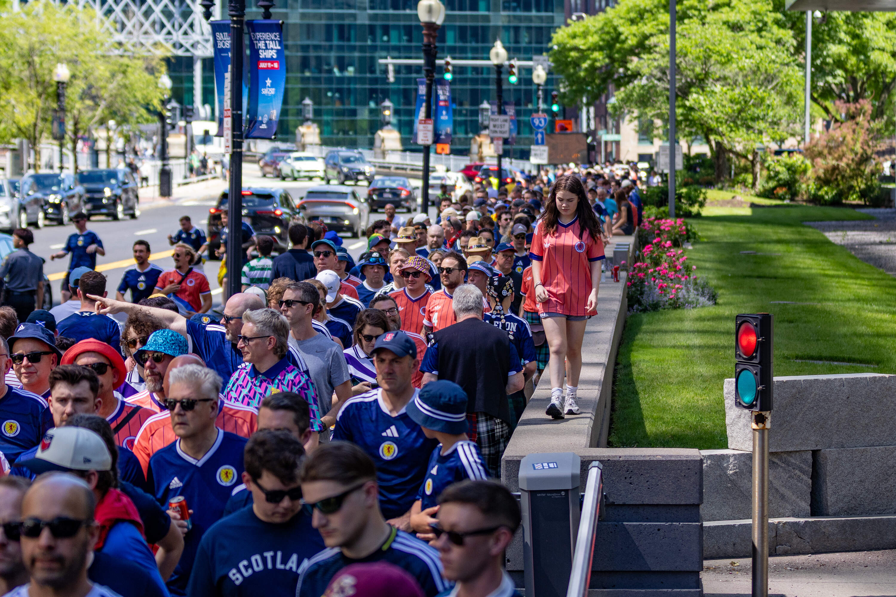The line of fans boarding trains to Foxborough for the World Cup stretched from South Station, down Congress Street to Dorchester Avenue. (Jesse Costa/WBUR)