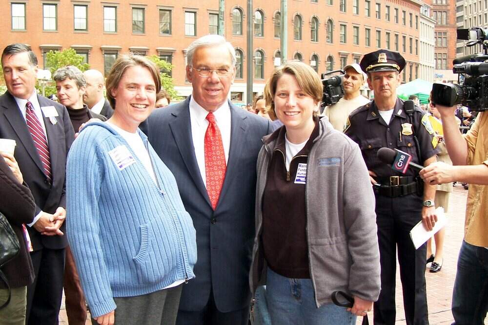 Inga Bernstein and Christine Nickerson pose with Mayor Thomas M. Menino while waiting in line for a marriage license at Boston City Hall on May 17, 2004. (Courtesy Queer History Boston)